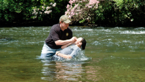 Photo of baptism for 30-30 Ministries camp